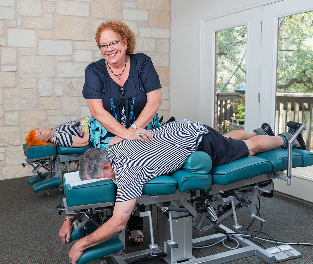 Chiropractor Austin TX Michele Gerard Adjusting Patient